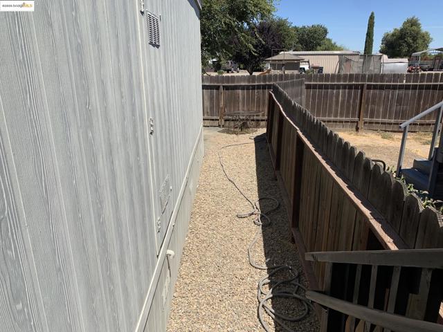 View of fenced backyard