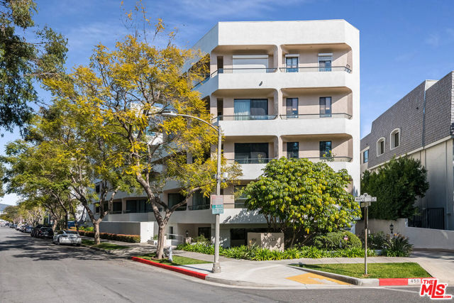 450 N Maple Drive 401 Beverly Hills, California 450 N Maple Dr #401 is a stunning residence located in the prime neighborhood of Beverly Hills. This single-level home boasts four bedrooms and four bathrooms, making it an ideal home for families or those who enjoy hosting guests. With gorgeous herringbone hardwood floors throughout the spacious living space of 3,968 square feet, this property exudes timeless elegance and sophistication.As you enter the home, directly from the elevator, you are immediately struck by the large windows that flood the living space with natural light. The open floor plan seamlessly connects the living room, dining area, and kitchen, creating a perfect flow for entertaining. The living room features a grand fireplace adding a touch of warmth and coziness to the space.The gourmet kitchen is equipped with top-of-the-line appliances, granite countertops, a center island and large pantry. In addition to the 4 bedrooms, the home also consists of multiple balconies, a grand dining room and large den featuring a handsome wet bar, perfect for hosting and entertaining guests.In addition to the living space, the property offers a Pool/Spa, Gym, Secured Gated parking with three side by side parking spaces for the residents, and an additional two spaces for guests. This luxurious property is listed at $3,495,000.00, reflecting its prime location near fine dining, world class entertainment and exquisite shops. With its herringbone hardwood floors, open floorplan, multiple fireplaces, and modern amenities, this home is the epitome of Beverly Hills living.