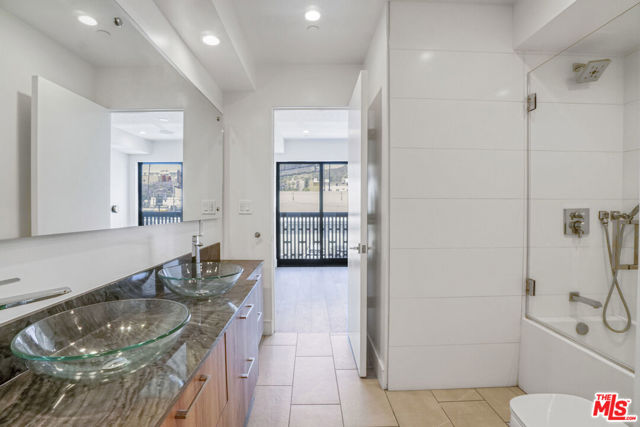 1445 1/4 N Martel Avenue, Los Angeles CA: https://media.crmls.org/mediaz/38430f5c-d72c-450c-ac26-cc0bf01ae964.jpg
