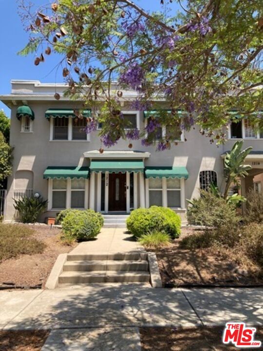 1212 1214 S Tremaine Avenue, Los Angeles CA: https://media.crmls.org/mediaz/38567fbd-da77-44fc-a4ac-8d7927062a74.jpg