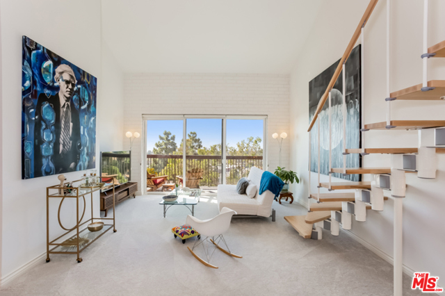 15515 W Sunset Boulevard 407 Pacific Palisades, California Elegant 2 story Penthouse just steps away from the newly imagined Carusos Pacific Palisades Village. 1800 square foot architectural with 3 beds & 3 baths, office & workout area. This lofted & open style floor plan is the ultimate unit in the building!! Extremely bright, aided by numerous skylights, vaulted ceilings, strategically placed windows & glass doors that capture unobstructed ocean & mountain views. Large primary bedroom suite with walk-in closet & luxurious ensuite bathroom. 2 additional bedrooms are generous in size. Open-concept, gourmet kitchen with an abundant amount of counter & cabinet space, newer stainless steel appliances & barstool countertops. Large living room opens to an oversized balcony. Just outside the building is direct access to Temescal Canyon hiking trails & a short walk to restaurants, grocery shopping, great schools & all that the Village has to offer. Unheard of 4 PARKING SPACES with plenty of storage. HOA dues include EQ insurance! Floor plan in photos