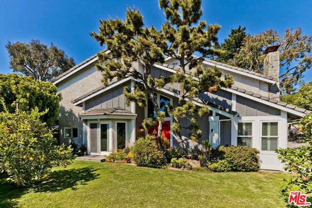17133 Avenida De La Herradura Pacific Palisades, California Nestled within the lush, natural landscape of the beautiful Palisades Highlands, this impeccably maintained and updated farmhouse has everything you'd want in a family home. Step-down living room, grand dining room and comfortable family room that opens to the kitchen, ideal for casual entertaining. The efficient remodeled kitchen offers Caesarstone counters, designer tile backsplash, stainless Viking oven/range/hood and plenty of storage solutions. Mature fruit trees, patio with built-in BBQ, hot tub and grassy yard. Upstairs are the spacious bedrooms, the stately master with sitting area, balcony and large walk-in closet, beautiful attached bath with two sinks in the vanity and an oversized tub. Additional amenities include: private office, Nest temperature control, Ring doorbell system and two car attached garage with an abundance of storage. Located near the pool, tennis courts and play area of the nearby rec. center and mere moments from the ocean and Palisades Village.