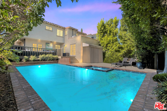324 S Roxbury Drive Beverly Hills, California *Rare offering in coveted Southwest Beverly Hills* Stunning 3,050 sqft Spanish Courtyard Villa features a resort-like Pool, Spa & spacious backyard to enjoy year-round! Charming, hidden from street view w/private gated entry, serene garden & graceful archways greets all with warm sophisticated interiors extensively remodeled in 2012 with New Kitchen & Baths, dual HVAC systems, chic contemporary decor & beautifully blended period details w/modern design. An Ideal floor plan w/4BRs, 3.5BAs, Living, Dining & Family Rooms. Kitchen & Butlers Pantry w/dual work areas, 2 sinks, Miele & Bosch dishwashers, Wolf & Sub-Zero appliances to create intimate meals or party events. Spacious Main bedrm suite features luxurious spa-like bath, dual dressing areas, huge walk-in closet & tons of built-ins. Poolside veranda w/granite bar & expansive patio & play area. Gated driveway & onsite 5 car pkg. Walk to LA's best dining & shopping plus acclaimed Beverly Hills schools, RoxburyPark & Class 1 Fire/Police