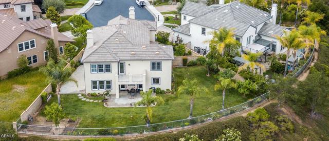 27070 Timberline Terrace Valencia, California 180 Degree View House with Large and well-Maintained yard & Four car Garage on a quiet cul-de-sac. A luxury home of 3,241 sq ft rests on a 9,745 sq ft lot in the prestigious & gated Westridge community of Bent Canyon Tract. Richly appointed spaces include living room with a fireplace, high ceilings, wooden shutters & flooring, and surround sound speaker system. A gourmet kitchen equipped with built-in refrigerator, island, granite countertops with back splash, walnut cabinets, hood & double oven. A private balcony for relaxing is off the master bedroom with views of the mountain, city lights, and neighboring golf course. Additional features include a spacious loft area, walk-in closet, crown molding, two fireplaces, as well as a secluded & spacious back and side yard with Spectacular views. Community amenities include Olympic sized pool, spa, tennis & basketball courts, playground for children & much more. This is a must-see house with great curb appeal!