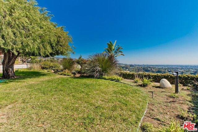 912 Lachman Lane Pacific Palisades, California First time on the market in over 50 yrs! Incredibly rare opportunity to build your dream home from the ground up or remodel the existing mid century 4 bedroom home with beautiful ocean views! Prior to confirming showings, we must receive signed CAR Form PEAD-V. (Coastal Commission applies to property.)