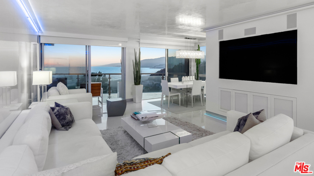 201 Ocean Avenue 409P Santa Monica, California Once in a lifetime opportunity to own the best unit in the building. Completely reimagined 3 bed/2.5 bath. 180 degree panoramic views from the Ocean to the Canyon. Top of the line designer kitchen with all Miele appliances, Miele built in cappuccino machine and white Carrera Italian fine slabs. The walls and ceiling were done with fine Italian white porcelain to capture the double ocean views. Remote control Lutron lighting system, LED with surround sound, RGB mood lighting and electronic window shades. Master suite showcases electronic doors that open up onto your unobstructed ocean view. 5-star amenities including Valet Parking, 24-hour security, Concierge service, Pool, Gym and Spa. Steps to the beach and world famous restaurants.