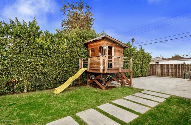 Custom Play Structure and expansive yard