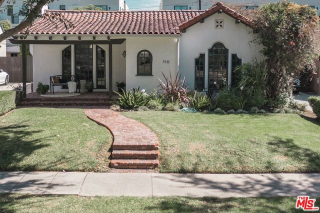 316 S Crescent Drive Beverly Hills, California This soulful and emotionally engaging, REMODELED, single story, 3-bedroom Spanish home sits proudly on the coveted 300 block of S. Crescent Dr., less than three blocks from the heart of one of the most popular and famous shopping, retail, fashion, dining and lifestyle districts in the world - the Beverly Hills Village. The home boasts a wonderful open floor plan layout with living room, den, dining room and remodeled kitchen featuring Thermador pro-style appliances (6-burner plus griddle range, refrigerator and dishwasher), in addition to a Monogram wine refrigerator. The primary bedroom suite is masterful and features two walk-in closets and a beautiful, remodeled spa-like bath with freestanding tub and heated floors. There are two additional ample-sized guest bedrooms (one of which is en suite and has heated floors and the other has a full bath conveniently located directly across the hall). Gorgeous hardwood floors bring a warm, organic and contemporary aspect. Numerous windows and skylights bathe the interior with motivational natural light. Tesla car charger included.