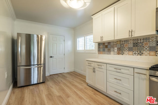 445 S Mansfield Avenue, Los Angeles CA: https://media.crmls.org/mediaz/3a1daeb8-b01d-4eb7-bbec-1097e375738b.jpg