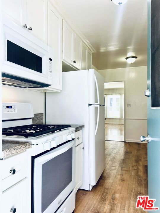 1839 N NORMANDIE Avenue, Los Angeles CA: https://media.crmls.org/mediaz/3a3e4655-6c65-42f0-9bb9-74288cef5d9d.jpg