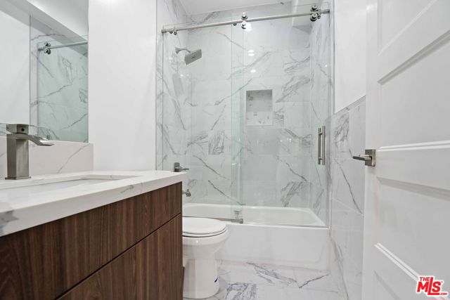 2125 S Rimpau Boulevard, Los Angeles CA: https://media.crmls.org/mediaz/3a78c1d6-7be5-46f8-8705-8546c7d1703f.jpg