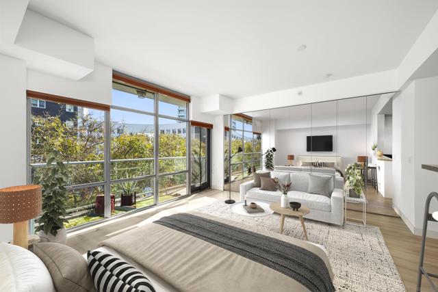 Bedroom with sofa and TV