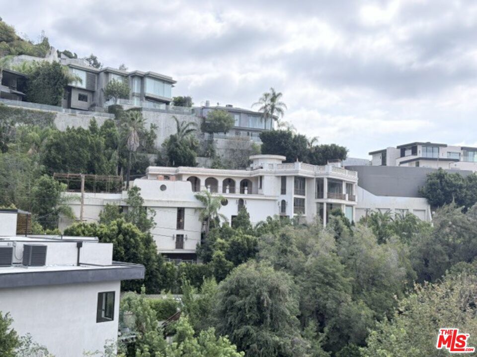 1754 Sunset Plaza Drive — architectural residence