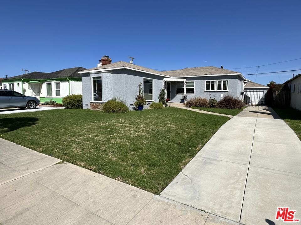 2421 W 80th Street Inglewood, California Presenting this well kept property in Inglewood great for Investors, first time buyers, and those looking to settle into a well maintained property with a large yard with potential to grow! The property features newer appliances complete with washer/dryer and contemporary shaker cabinets topped with granite countertops. There is an adequate amount of parking with a detached 2 car garage and a spacious driveway.