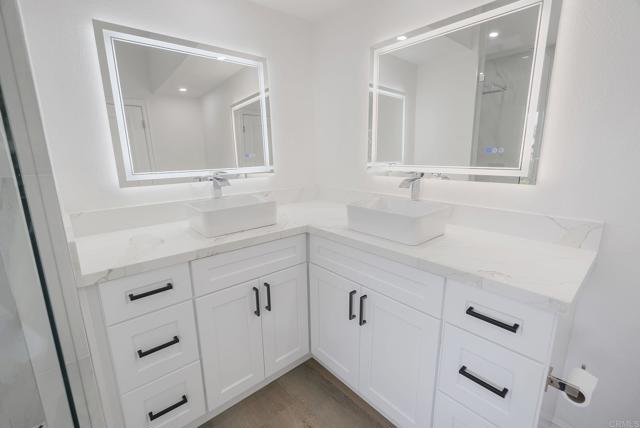 Backlit Mirrors w/Humidifier & Lighting Options!  Dual Sinks & Vanities.  Unwind or Get ready!