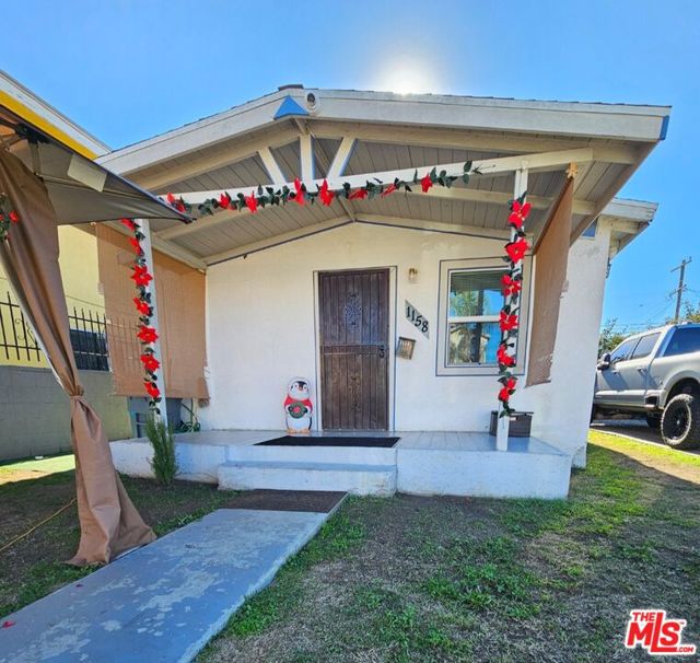 1158 E 77th Street, Los Angeles CA: https://media.crmls.org/mediaz/3d042c05-8e14-40a3-9dda-3ac128ef2701.jpg