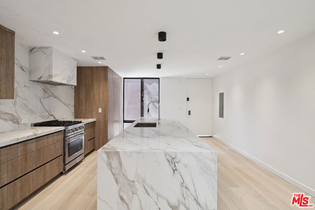 1033 Carol Drive, West Hollywood CA: https://media.crmls.org/mediaz/3d609270-023f-4882-ae44-024ce80de08f.jpg