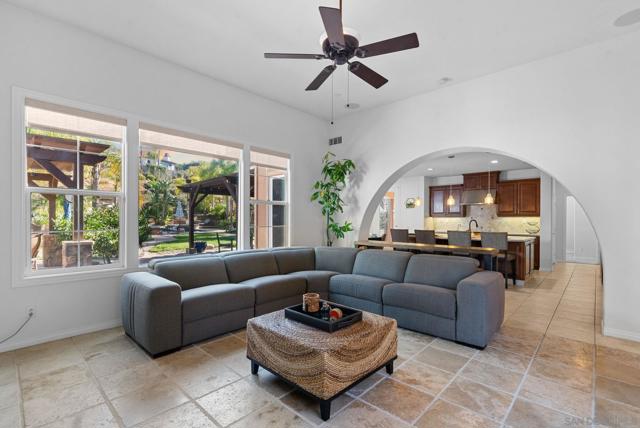 Family room looking towards kitchen and back yard