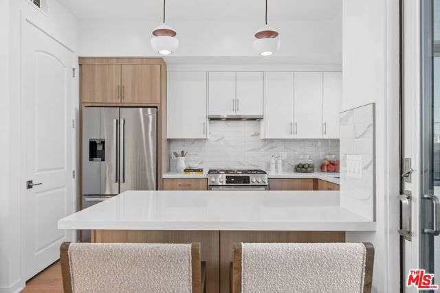 1248 S Bronson Avenue, Los Angeles CA: https://media.crmls.org/mediaz/3d78d61e-de3a-42e5-a7e4-b4e3ceb4bcf5.jpg