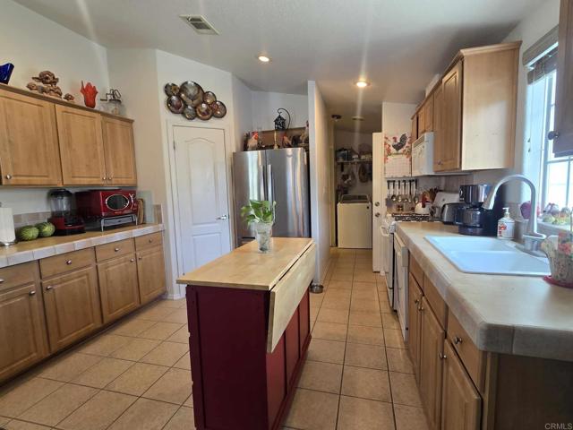 450 E Bradley Avenue, El Cajon CA: https://media.crmls.org/mediaz/3f2fc04b-420b-4726-bc6a-1862add52fbc.jpg