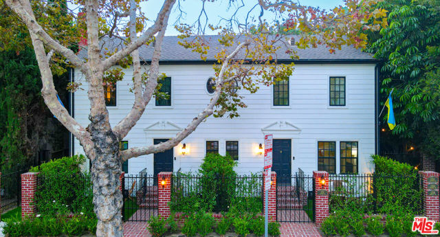 Built by Ray P. Stahmann, a renowned Beverly Hills builder during Hollywood's Golden Age, this 1936 French Revival townhome is a timeless masterpiece in the heart of Beverly Hills.  Tucked away behind Saks Fifth Avenue, the compound is comprised of five Townhomes in a provincial courtyard setting with lush landscaping and al fresco dining.  The Townhouse is 1,295 square feet of expansive living space with 2 bedrooms, 1 full bathroom upstairs, living room, dining room, kitchen and powder on the ground level.  Home features 9' ceilings, wood-burning fireplace, stunning hardwood floors throughout and two own-entrances.  A front fence and gate creates a private gated front yard for the Townhome.  Comes with private 1-car garage, 2 street parking permits; additional monthly garage parking available at Saks Fifth Avenue parking structure.  In prime Golden Triangle location, just three blocks from Rodeo Drive, this is the ultimate in Beverly Hills living.  Send all offers to basil@palari.com and copy sandy@palari.com.