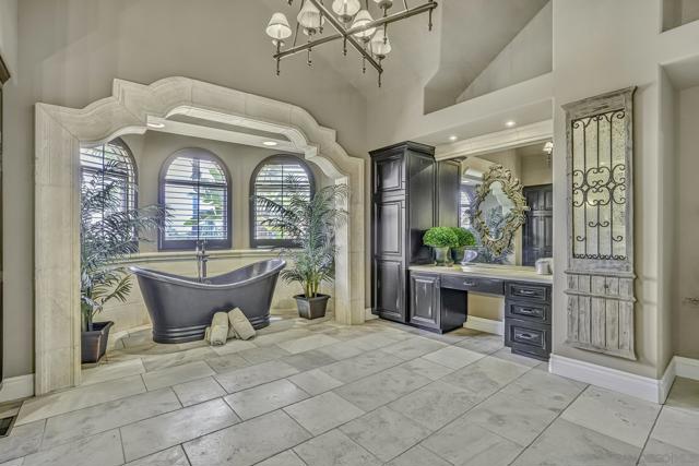 Gorgeous soaking tub in the primary bathroom