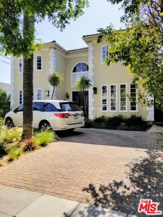 361 S Almont Drive Beverly Hills, California TWO-STORY FRENCH MEDIT. 4 BDMS 4.5 BATHS, GOURMET KITCHEN, HOME SITUATED BEHIND WROUGHT-IRON GATES. SWEEPING OAK STAIRCASE LEADS TO SECOND STORY. A/C, SEC., HDWD FLRS, BUILT-IN VACUUM CLEANER, HUGE MASTER WITH MAGNIFICENT CLOSETS. FP IN LR AS WELL AS FRM. OPENING TO NICE-SIZED REAR GARDESN. WALK TO EVERYTHING. PARKS, TRIANGLE, SCHOOLS, HOUSES OF WORSHIP. THIS HOUSE WAS COMPLETLY PAINTED. NEW POOL PLASTER WAS DONE. NEWER ROOF. MUCH MORE TO SEE!!
