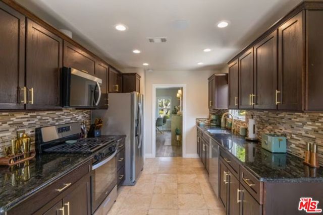 725 N Harvard Boulevard, Los Angeles CA: https://media.crmls.org/mediaz/40d2de39-99d8-46cf-b143-e76c6c304de3.jpg
