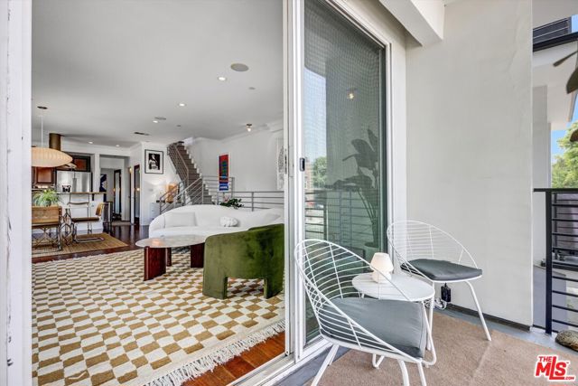1153 N Formosa Avenue, Los Angeles CA: https://media.crmls.org/mediaz/40de32b3-c511-4c8b-a050-924e6adf5a5d.jpg