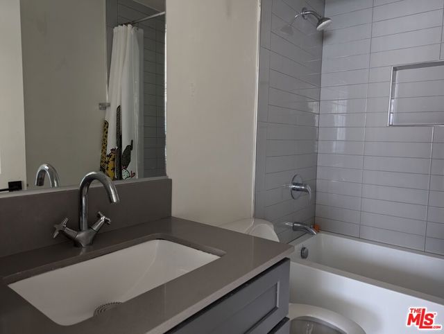 310 S Kenmore Avenue, Los Angeles CA: https://media.crmls.org/mediaz/4111a934-4b1a-4c5e-a19a-86f7dac0a838.jpg