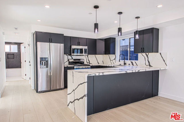 5709 Auckland Avenue, North Hollywood CA: https://media.crmls.org/mediaz/41afc5f2-13a7-4a14-88e4-43daa37f38f1.jpg