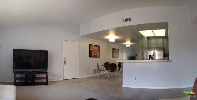 31200 Landau Boulevard Cathedral City, California Remodeled 2BR/2BA Top Floor Modern Condo in the secure gated community of Cathedral Springs. This is the largest 2 bedroom model in the complex. The vaulted ceilings make this unit feel extra spacious. Sparkling pools, cozy spas, tennis courts and a gym all add up to refined desert living. Primary bedroom comes with en suite bathroom, walk-in closet, sliding glass door and covered balcony. Second bedroom has its own sliding glass door with access to the balcony and attached jack and jill bathroom for guests or can be a 2nd private suite. Convenient inside large laundry room with a full sized washer and dryer and plenty of cabinet space for storage. There is also a large storage closet outside on the balcony. One reserved covered parking spot and plenty of guest parking available. All appliances, electronic keypad for front door, and Nest thermostat included. Cathedral Springs is one of the few communities in the area already FHA approved.