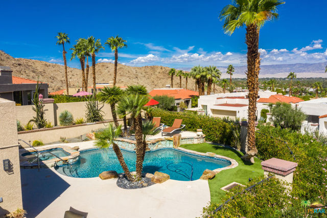 34 Mirage Cove Drive Rancho Mirage, California Magical Mirage Cove ~ A Hidden Gem of an Intimate Gated Complex of only 69 Single Family Homes on Terraced Pool Size VIEW Lots. This stunning home has been almost totally re-imagined in 2018-19 - Almost every surface has been tended to with quality workmanship - Nestled near the top of the hill - The 180 + Degree Views are ever-changing as the Sun bathes our Desert Paradise - One enters this home through twin Leaded Glass Entry Doors to the entry gallery - Your first glimpse of white marble-like ceramic tile flooring throughout - Turn right to the newly created Great Room - Living/Entertaining Areas with elongated skylight - AMAZING Gourmet Kitchen with Top Of the Line Meile Appliances - Semi Formal Dining Area taking in the VIEWS ~ This whole Area of the home faces North West to a Most Generous Outdoor PlayGround with Sparkling Swimming Pool with WaterFall and raised Spa with Spill Over ~ The Primary Bedroom Suite also opens onto this area so one can wake to a Sunrise Mountain View ~ The Primary Suite offers a Spa-Like Bath with Another Sky Light, Walk-In Closet, Twin Wall Closets and Water Closet ~ And Beat Goes On to the Junior En Suite Guest Area Totally Private - (Another Great Bath included here) On to the Third Bedroom with a Three Quarter Bath doubling as a Powder Room - Add a Generous Utility Romm with Newer SamSung Laundry Appliances - from here to the Double Attached Garage offering Lively Raspberry Epoxy Flooring and Built-In storage - Mirage Cove offers Two Tennis Courts - Community Pool/PartySpa and Two Pickle Ball Courts - One of the best locations in our Coachella Valley - Get almost anywhere within about 20 minutes. There is SO Much More to this home - Please take some time to study the Slide Show of Photos -