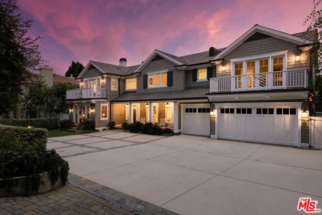 117 S Burlingame Avenue Los Angeles, California Luxurious, sophisticated, gated and secluded 7,576 square foot East Coast Traditional with six bedrooms and eight baths in the heart of exclusive Brentwood Park. Developed by high-end developer, Mark Schwartz, the home features distressed walnut floors and stunning finishes throughout. The first floor boasts a very large gourmet kitchen, a butler's pantry, an office with rich wood paneling, living room, dining room, wine cellar, library and family room with bar area that overlooks the beautiful and private backyard. The second floor offers an upstairs family room, three ensuite secondary bedrooms, a guest suite/media room and an expansive master suite with sitting area, office, large walk-in closet and a spa-like master bath. A sixth bedroom downstairs would make an excellent game room, gym or additional office space. The spectacular grounds feature an outdoor loggia and fireplace, BBQ and bar area, pool & spa with automatic pool cover, trellis, & expansive lawn.