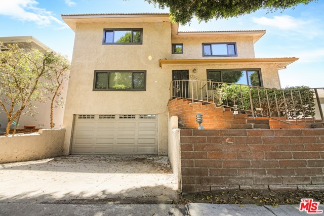 2314 Oak Street Santa Monica, California Amazing Owner User or Investment Opportunity! 2314 Oak Street presents a unique pride of ownership apartment building situated in the Sunset Park District of Santa Monica. Built in 1971, this two-story, walkup style property consists of six (6) total units featuring one (1) large three-bedroom three-and-a-half-bathroom townhouse delivered VACANT, and five (5) two-bedrooms two-bathroom units. At approximately 3,000 SqFt, this potential Owners Unit is a three-story townhouse located in the front of the building with direct access to a large four (4) car garage, offering spacious bedrooms with walk-in closets, multiple living areas, large basement with bar top, ample storage spaces, and private roof top deck with city views. The townhouse is fully remodeled with upgraded flooring, kitchen, bathrooms, and equipped with brand new windows, in-unit washer/dryer hookups, and upper-level laundry chute for convenience. With this rare buying opportunity, you can immediately occupy the vacant three-story townhouse, or further renovate the unit to achieve top market rent, while collecting income on the remaining five units.