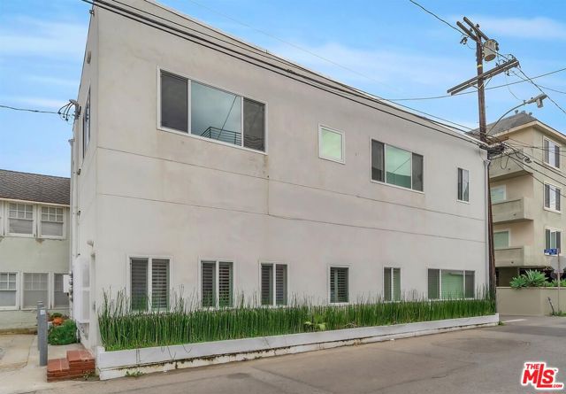10 27th Avenue Venice, California Location, location, location & ADU Opportunities! This 4-unit building, All units renovated and updated & fully furnished in 2022, is literally one house away from the ocean sands with direct access to Venice beach & hip areas of volleyball & yoga on the sands & top of line shops & restaurants. Situated on the corner of 27th Ave & Oceanfront Walk. Each unit is clean, airy, contemporary, & fully furnished, with high-quality cabinetry, artwork, stainless appliances, & a washer/dryer, TVs, linens, plates,& silverware. Lovely baths and kitchens and wood laminate flooring. Well-maintained building. Plumbing and electrical has been updated to current codes. 9-car parking lot contiguous to the 2-story building. Investor's can build a two-story ADU on top of the parking to use for up to 2 additional rental incomes plus an oceanview rooftop & due to the current 3 ft Height increase approved by the city, the extra cost to destroy the ground of parking is not needed & investor's gain normal income during construction with Tremendous upside potential. short term rentals will bring up to double income if managed correctly. All units are easy to show. Seller financing available or assumable loan with low rate.