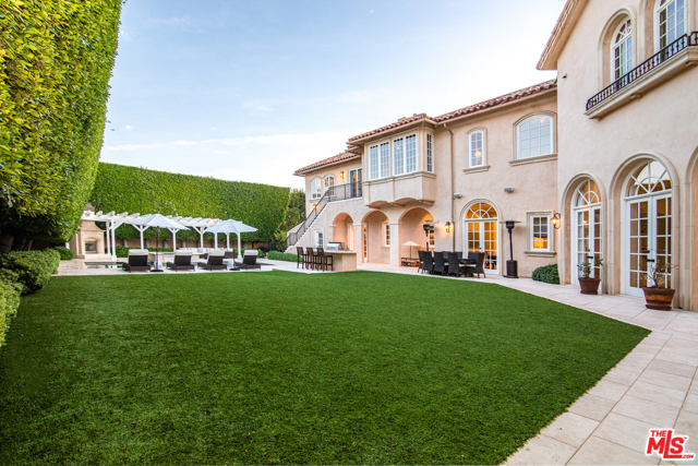 1206 Amalfi Drive Pacific Palisades, California Located in the heart of the Palisades Riviera sits this beautiful five-bedroom estate with exquisite finishes and careful attention to design and detail. With grand scale and vaulted ceilings throughout the home is flooded with natural light. Beautiful wrought iron and glass front door lead to the grand two-story formal foyer. The spacious chefs kitchen has top-of-the-line appliances is an entertainers dream. Opening to the family room with wet bar and controlled temperature wine room. The master bedroom features a large private patio with stunning views. The backyard is your own private oasis with a large inground pool, spa, fireplace and cabana. Three additional en-suite bedrooms, maids room, office with fireplace, elevator, theater and beautifully landscaped grounds complete this spectacular offering.