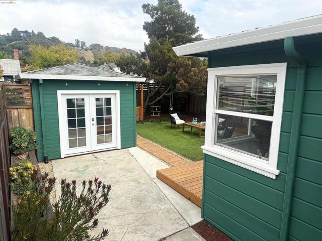 View of outdoor structure featuring french doors