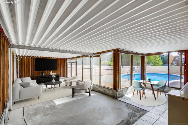 Inside patio room with pool view!