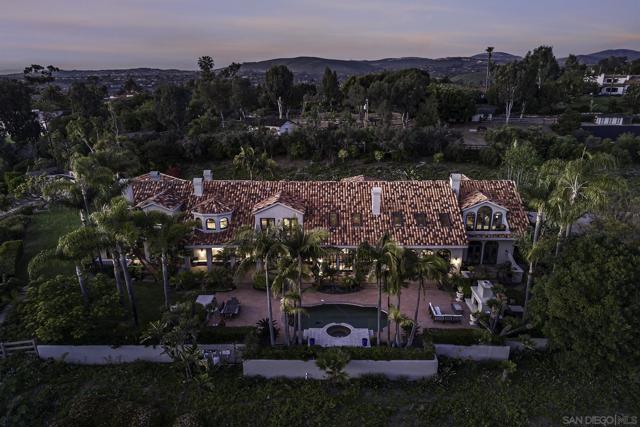 Rear aerial view of this Expansive property