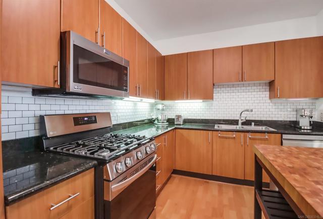 1465 C St, San Diego CA: https://media.crmls.org/mediaz/4521a93f-90f9-462e-a6b4-5e4636e51d86.jpg