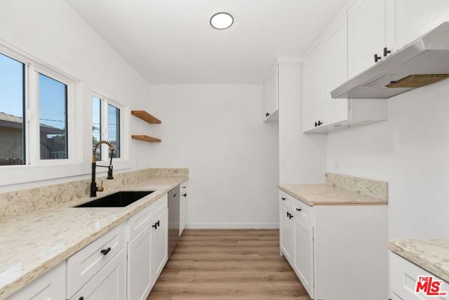 672 E 119th Street, Los Angeles CA: https://media.crmls.org/mediaz/453207a0-ea4b-404e-982f-d3a7b35d6a82.jpg