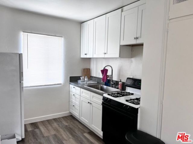 1225 S Normandie Avenue, Los Angeles CA: https://media.crmls.org/mediaz/4550eb41-e961-4d59-a2cb-3487006bbbff.jpg