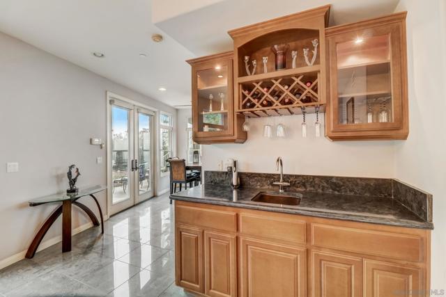 Main Home - Wet bar with porcelin sink and granite countertop.