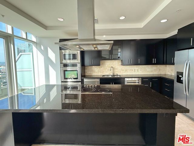 717 W Olympic Boulevard, Los Angeles CA: https://media.crmls.org/mediaz/459dcc00-30ab-4f2d-b77d-e885c9c81b69.jpg