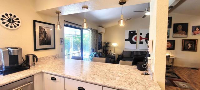 KITCHEN COUNTER BAR TO FAMILY ROOM