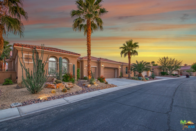 81605 Avenida Santiago Indio, California Extraordinary "ONE OF A KIND" 2BD/3BA, plus office (or den) & an attached large BONUS ROOM (17.8 x 22.8 = 370 sq. ft. room addition, could be used for home office, home gym, craft room, man cave, game room, extra bedroom or a wonderful home theater)! Exquisite & elegant home, but yet very casual! Very OPEN FLOOR PLAN w/10' ceilings! Gourmet kitchen w/island, pantry, granite counter tops with stunning backsplash! Cozy separate dining room! Very spacious master w/totally remodeled bath w/ customized shower! Huge walk-in closet! Lots of windows throughout w/CUSTOM SHUTTERS looking out to a large gorgeous walled-in PRIVATE beautifully desert landscaped backyard w/custom FIRE PIT & water feature! Newly refinished patio by Concrete by Design w/awnings across the back of this beautiful home! 3 Car finished garage w/AC & storage cabinets! Stunning home "Looks like a model"! SO MUCH MORE TO MENTION! (55+ community)