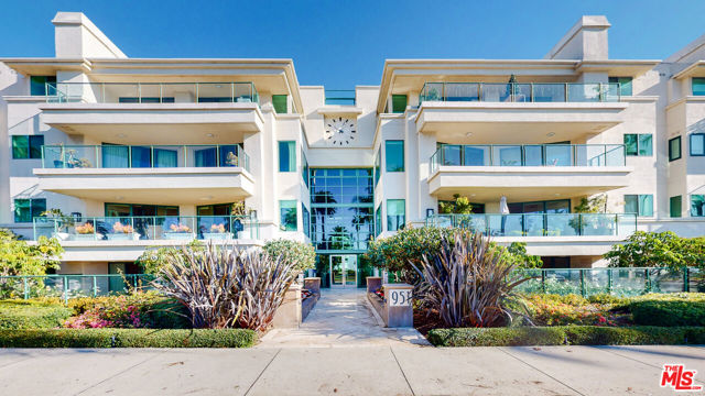 Spectacular one-level residence in a highly sought-after 24-hour concierge building in Santa Monica! This approximately 3200+ sq. ft Ocean Avenue unit offers park and ocean views, an open floor plan, and an incredible outdoor space. The main living space is designed for comfort and style, featuring a gourmet kitchen, a cozy living room with a fireplace, a formal dining room, and a den that opens up to a large backyard perfect for hosting gatherings and creating lasting memories. The primary bedroom is a true sanctuary with a generous walk-in closet, a spacious bathroom complete with a soaking tub, and direct access to the front patio providing a tranquil escape right at your doorstep. The second bedroom is also ensuite, offering privacy and convenience with its own walk-in closet. Parking is hassle-free with two covered assigned spots. In addition to its incredible features, the building itself offers a luxurious lifestyle. Enjoy the rooftop pool and spa, stay active in the fully-equipped gym, entertain guests in the deluxe community room, and experience the convenience and security of a 24-hour doorman. Location is key, with easy access to Santa Monica's renowned restaurants, shops, enchanting hikes, scenic bike trails, great schools, and the beautiful beach. Embrace the vibrant coastal lifestyle and make this exceptional residence your own.  Seller is a licensed CA realtor.