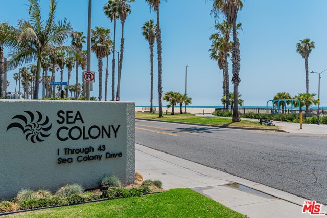 30 SEA COLONY Drive Santa Monica, California FRESH NEW LOOK! Come & See! Steps to the beach!!! Terrific value!!! Great price!!! Live at the beach in the amazing guard-gated Sea Colony One community. A rare opportunity and incredible lifestyle! This 2 bedroom, 2 1/2 bathroom multi-level townhome has beautiful ocean views. The Master Suite, on its own level, has a fireplace, a skylight in the master bath & a walk-in closet. The 2nd bedroom has its own private patio & looks out to a park-like environment. Sit in the bright living room w/ hardwood floors & fireplace, & enjoy the ocean view. There is also a Bonus Area/Office w/ Wet Bar & window looking out to the ocean. One can step out onto the patio for outdoor dining or eat in the formal dining room inside. The kitchen has a granite countertop, tiled floors, & a window facing the garden. There is a 2-car garage & laundry room, too. Come take a look! It is a fantastic place to live & is close to Main Street shopping. (Complex has a community spa which is not currently operable & may be removed.)