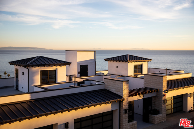 17318 TRAMONTO Drive 701 Pacific Palisades, California One Coast is over 50% Sold Out! Residence 701 at One Coast is a new, Phase I, two-level ocean-view home offering 3-bedrooms, and 3.5 baths. Designed to maximize indoor-outdoor living with main-level lanai and expansive private rooftop deck offering sweeping views of the Santa Monica Bay out to Catalina, this is maintenance free coastal living at its best. Drive through the 24-hour guard-gated entry down a private drive and into a private 2-car garage with direct access into the home. One Coast presents a unique offering of oceanfront residences on the bluffs above PCH & Sunset Blvd. in the Pacific Palisades. Luxury condominium homes that live like a single-family residence, with the privacy and convenience of a lock-and-leave lifestyle. Single and multi-level homes with 2 - 5 bedrooms, up to 5 baths, and ranging from 2,810 - 5,017 sq. feet of living space with finest finishes such as Waterworks bath fixtures and soaking tubs, Subzero/Wolf appliances, hardwood flooring and Caesarstone countertops. En suite baths throughout. Ample walk-in closets. This is where you can live close to the city but escape to your home. New construction, concrete and steel structures make One Coast a highly desirable buy for those looking for a hillside home by the ocean. Tours by appointment.
